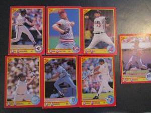 lot 230 image: SCORE 1990- various teams and players. Cards 228-405. Bot consecutive. 7 cards total. Fair condition, faded, worn edges.