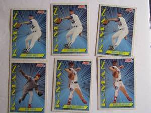 lot 234 image: SCORE 1991 �K-MAN�. Cards 407, 410, 411. 6 cards total. Average condition, edge staining.