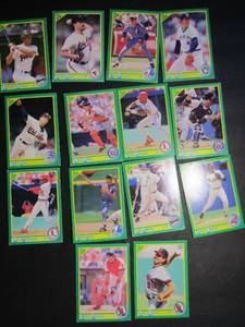 lot 231 image: � SCORE 1990- various teams and players. Cards 12-214. Bot consecutive. 14 cards total. Fair condition, faded, worn edges.