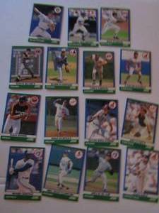 lot 239 image: � SCORE 1991-various players and teams. Cards 2-76. Not consecutive. 15 total. Average condition, faded, worn edges.