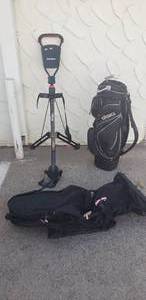 lot 114 image: Golf Lot Includes Tour Gear 3-Wheel Push Golf Cart (minus the Wheels), Bullet GolfClub Travel Bag and Ogio Golf Bag with Putter