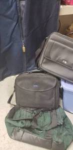 lot 143 image: Travel Luggage Lot Includes 2 Laptop Bags(Dell and Init), Hanging Clothes Bag and Patagonia Duffle Bag