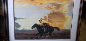 lot 28 image: Cowboy Riding a Horse Wall Art 33x27 Approx.