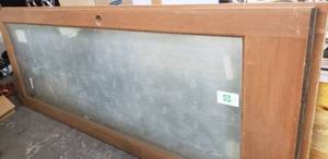 lot 165 image: Pair of Pilkington Energy Advantage Wood Frame Glass Doors 3x8x1 34 Solid Wood Core, Plastic Sheeting still on glass looks to have never been installed.