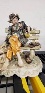 lot 24 image: Capodimonte made in Italy porcelain figure and David Winter Cottages collection