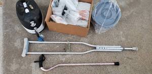 lot 168 image: Medical Supplies Crutch, Cane, Bed Side Toilet, Sponges, Syringes and Breg Circulation Unit