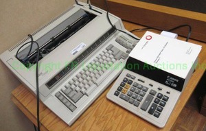 lot 127 image: IBM Wheelwriter 1000 by Lexmark and Canon printer claculator