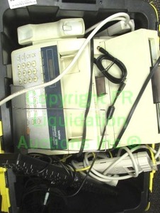 lot 99 image: Assorted electronics in tote as shown