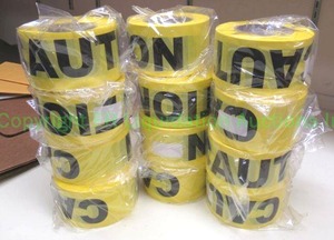 lot 91 image: Caution tape rolls, unopened as shown