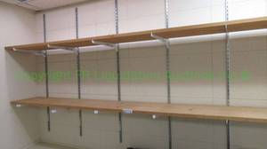 lot 60 image: Wall mount shelves plus hardware. attached to wall
