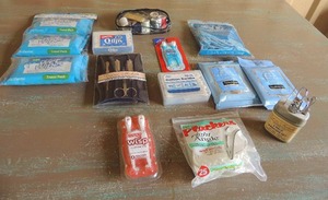 lot 34 image: On the go mini wet wipes, toothpicks, sewing kit, makeup wipes and more