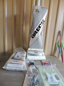lot 47 image: Oreck vaccum bags belts and other attachments . Oreck vaccum cleaner XL hypo allergenic filtering