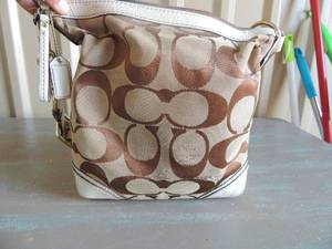 lot 50 image: COACH purse in brown, tan and white