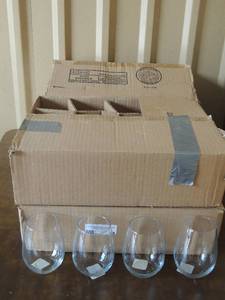 lot 74 image: 4 boxes of stem less wine glasses