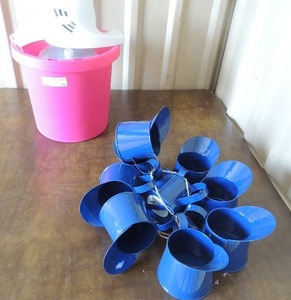 lot 77 image: 10 blue tea cups and Pink new Ice cream maker works