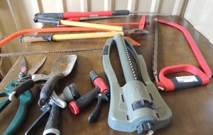 lot 81 image: Assorted yard tools- sprinkler, shovels, hand saws and more