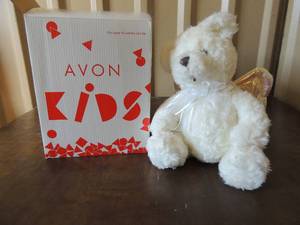 lot 86 image: NEW in BOX Avon lighted Music bear.