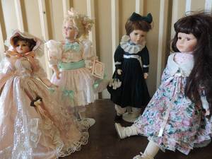 lot 87 image: Shane and Staffers dolls x 4 three are 18 one is 22 in floral dress