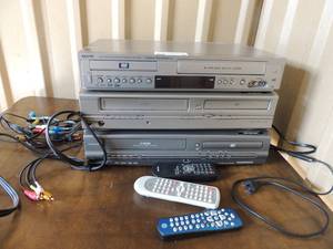lot 88 image: Sanyo VHS DVD player with remote, Emerson DVD VHS player with remote and Magnavox DVD VHS player with remote all unknown working order