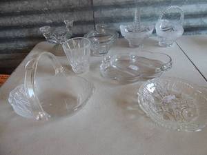 lot 101 image: Assorted clear glass dishes 2 crystal baskets and a covered candy dish
