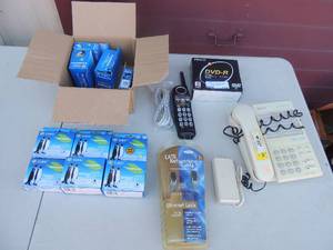 lot 114 image: 7 foot network cable new, Sony home phone, box of G&G prister ink, printco 5 pack new blank CD disk