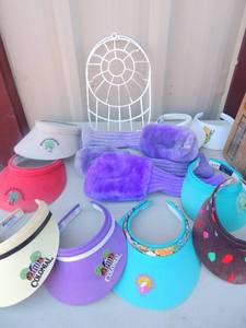lot 115 image: Assortment of gold sun visors, 4 golf club covers and 2 baseball cap holders