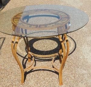 lot 8 image: Beautiful metal floral design table with oval glass top 30 high  42 diameter with glass