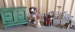 lot 27 image: Green wooden double door jewlery box. Left door broken but piece included, ceramic pug with human nose, people candle holder 7 tier candle stand and more.