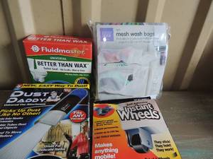 lot 31 image: Cleaning lot- Micro Vacuum kit, dust daddy universal vac, damage free hanging clips, fluid master toilet seal, mesh wash bags, foot switch extension cord
