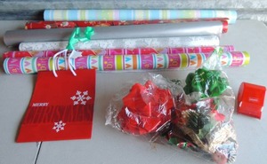 lot 105 image: Box of Christmas wrapping paper, bags and bows