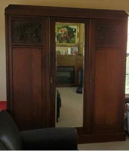 lot 1 image: Vintage European Knock Down Armoire. Probably Walnut, Circa early 20th century. Peg construction. Disassembles into 3 pieces for easy transport. Size 70w X71h X 20d IT GORGEOUS