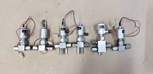 lot 116 image: Lot of 6 NuPro Stainless Pneumatic Valve Assemblies