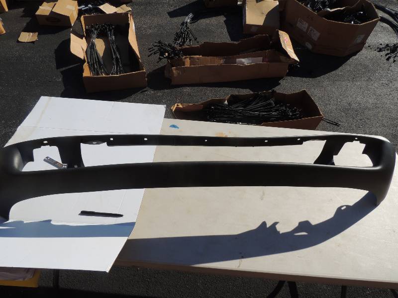 lot 30 image: FRONT BUMPER FOR FORD WITH FOG LIGHT OPENINGS - BLACK PART# 1L5417B635-FVW