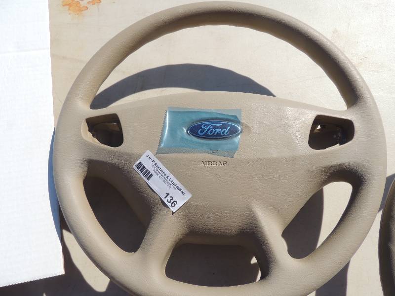 lot 136 image: TAN steering wheels qty 2...