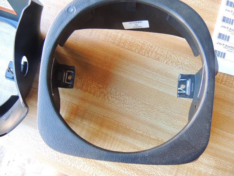 lot 56 image: STEERING COLUMN COVER - BLACK...