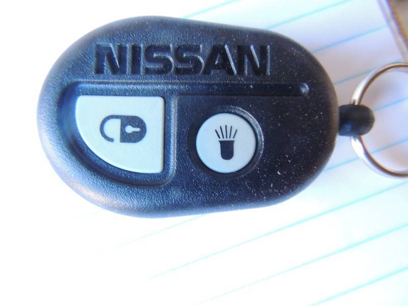 lot 274 image: Nissan key fobs...
