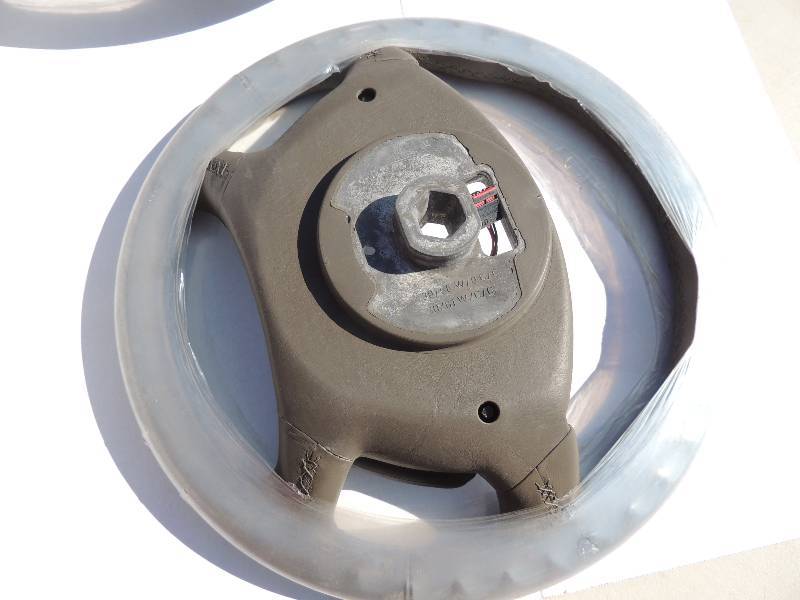 lot 111 image: Steering Wheels Grey with cruise control buttons