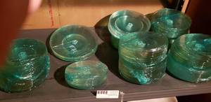 lot 70 image: Clear Glass Plate Set (wrapped in green cellophane) Most are Approx. 6