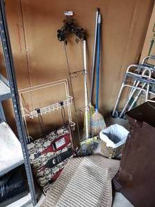 lot 58 image: Plate Holder Rack, Rugs, Brooms and Small Trash Can