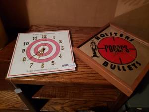 lot 98 image: Rogers Holsters Bullets Clock and Bullseye Clock