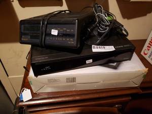 lot 118 image: Arris Dual Tuner DVR, Phone Mate 7000 Answering Machine, Tech2000 Alarm Clock Radio