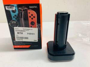 lot 76 image: Nintendo Switch Joy Con Charger 4