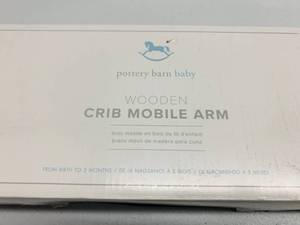 lot 119 image: Pottery Barn Wooden Crib Mobile Arm