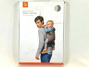 lot 59 image: Stokke My Carrier Baby Back Carrier (Up to 3 years 33lbs) in box