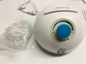 lot 99 image: Freemie Breast Pump