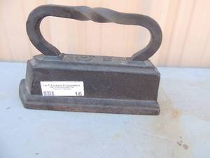 lot 16 image: Cast iron twisted handle marking- C-18 6x10x3