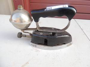 lot 53 image: Black & Silver cast iron Metal ball for steam etc. no markings 7x4x6