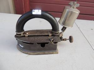 lot 54 image: Imperial brass MRO.CA. chicago USA model#5 Imperial self heating iron  with gassteam canister 6x3x6