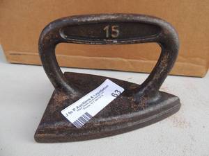 lot 63 image: Cast Iron marked #15 6x4x4