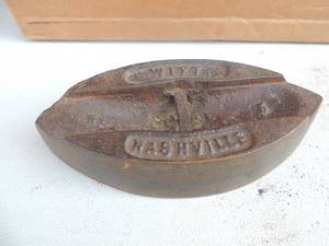 lot 73 image: Witt Nashville Cast iron bottom no handle has 1 loop marked #8 7x3x2